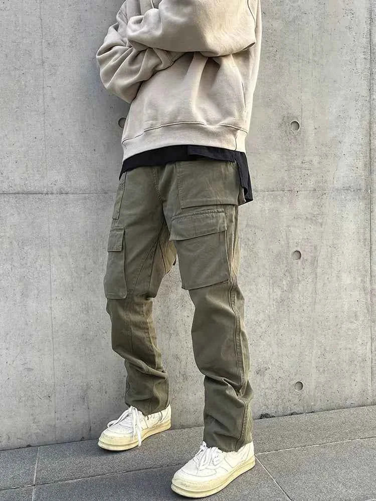 Men's army green Multi-Pocket Cannonball Cargo Pants by Mead's Supply & Equipment, cotton tactical outdoor wear with multiple storage pockets.
