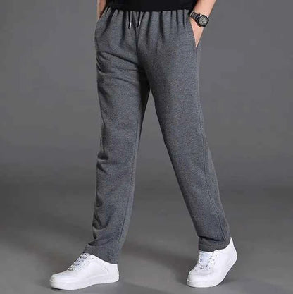 Men's oversized cotton casual knit sweatpants by Mead's Supply & Equipment Outfitters, black relaxed fit joggers with elastic waistband.