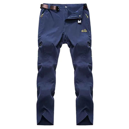 Men's black and grey quick-drying outdoor hiking pants from Mead's Supply & Equipment, waterproof, anti-UV, and breathable trekking apparel.