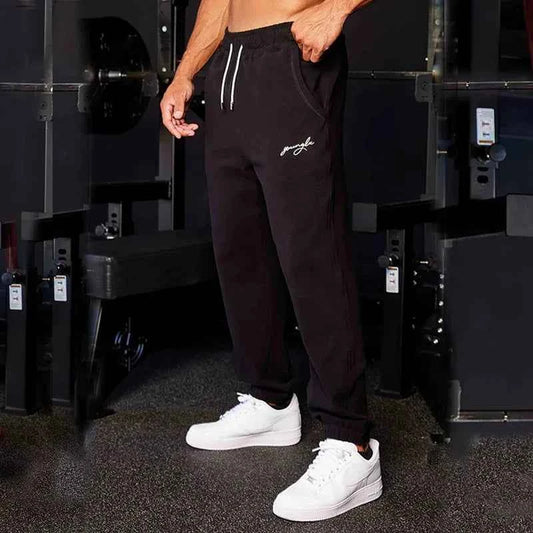 Men's black athletic joggers with side stripe, men's track sweatpants from Mead's Supply & Equipment Outfitters.