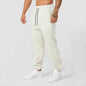 Men's black athletic joggers with side stripe from Mead's Supply & Equipment Outfitters, featuring a comfortable fit and sporty style.