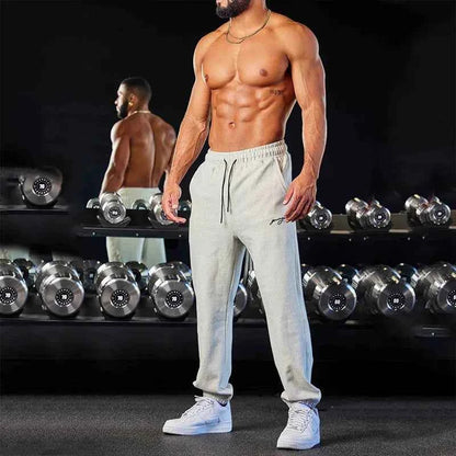 Men's black athletic joggers with side stripe from Mead's Supply & Equipment Outfitters, featuring a comfortable fit and sporty style.