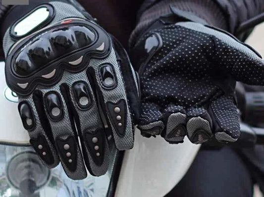 Black men's cycling gloves by Mead's Supply & Equipment Outfitters, showcasing protective motorcycle gloves designed for outdoor riding.