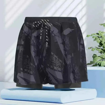 Men's black quick-dry swim trunks from Mead's Supply & Equipment Outfitters, featuring a stylish stroke pattern and suitable for swimming and beach.
