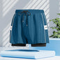 Men's black quick-dry swim trunks by Mead's Supply & Equipment Outfitters, featuring a stylish stroke design for swimming and beach use.