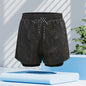 Men's black quick-dry swim trunks from Mead's Supply & Equipment Outfitters, featuring a stylish stroke design, ideal for swimming and beach.