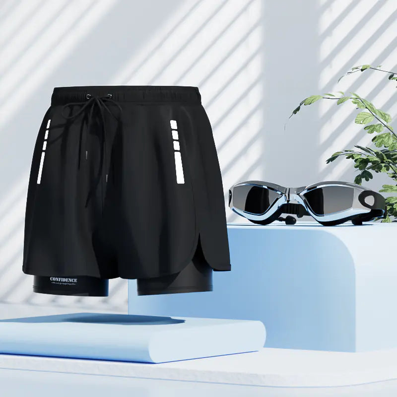 Men's black quick-dry swim trunks from Mead's Supply & Equipment Outfitters, designed for swimming and beach activities.