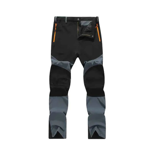 Men's windproof climbing pants by Mead's Supply & Equipment Outfitters, blue, breathable, moisture-wicking outdoor trousers for hiking and trekking.
