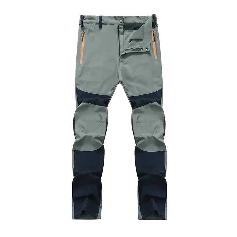 Men's windproof climbing pants by Mead's Supply & Equipment Outfitters, breathable and moisture-wicking outdoor trousers for hiking and trekking.