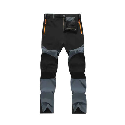 Men's windproof climbing pants by Mead's Supply & Equipment Outfitters, breathable, moisture-wicking outdoor trousers for hiking and trekking.