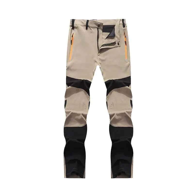 Men's windproof climbing pants by Mead's Supply & Equipment Outfitters in blue, breathable, moisture-wicking outdoor trousers for hiking and trekking.