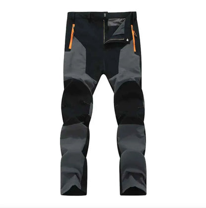 Men's dark blue Stretch Windproof Waterproof Hiking Pants by Mead's Supply & Equipment Outfitters, wear-resistant outdoor trousers.