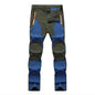 Men's dark blue waterproof hiking pants by Mead's Supply & Equipment Outfitters, windproof, stretch, wear-resistant outdoor trousers.