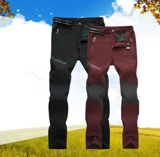 Unisex waterproof hiking pants made of breathable polyester, designed for outdoor adventures, by Mead's Supply & Equipment Outfitters.