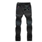 Unisex waterproof hiking pants in black made of breathable polyester, designed for outdoor adventures and outdoor gear.