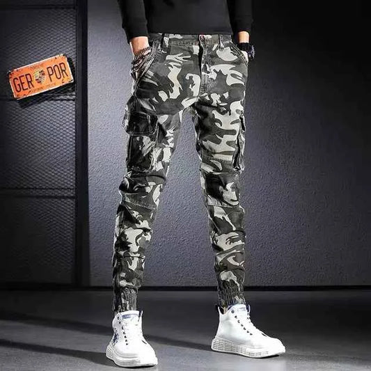Men's oversized camouflage cargo pants by Mead's Supply & Equipment Outfitters with multiple pockets and outdoor-ready design.