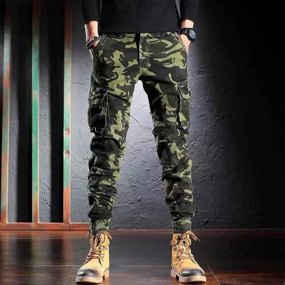 Men's oversized camouflage cargo pants by Mead's Supply & Equipment Outfitters with multiple pockets and outdoor-ready design.