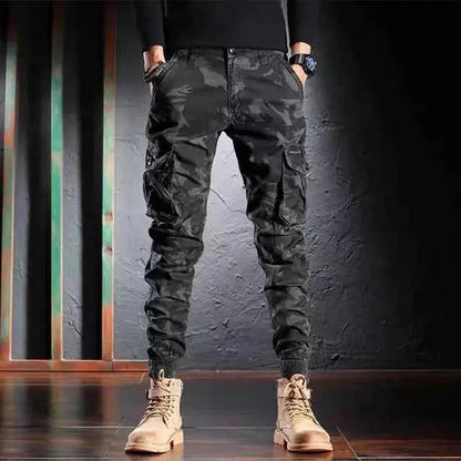 Men's oversized camouflage cargo pants with multiple pockets, outdoor men's clothing by Mead's Supply & Equipment Outfitters Limited.