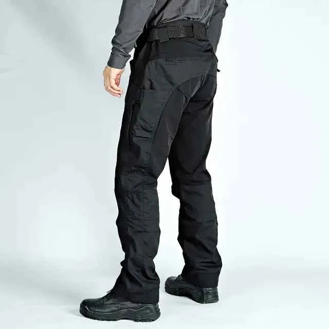 Men's green tactical cargo pants by Mead's Supply & Equipment Outfitters, outdoor combat trousers with multiple pockets.