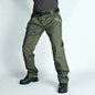 Men's green tactical cargo pants from Mead's Supply & Equipment Outfitters with multiple pockets, suitable for spring and autumn outdoor activities.