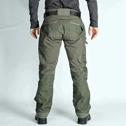 Men's green tactical cargo pants by Mead's Supply & Equipment Outfitters, suitable for spring and autumn outdoor activities.