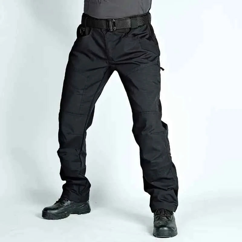 Men's green tactical cargo pants from Mead's Supply & Equipment Outfitters, suitable for spring and autumn outdoor activities.