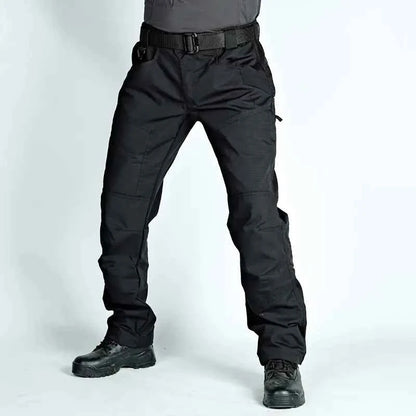 Men's green tactical cargo pants from Mead's Supply & Equipment Outfitters, suitable for spring and autumn outdoor activities.