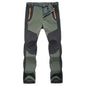 Army green unisex outdoor hiking pants by Mead's Supply & Equipment Outfitters, made of cotton with multiple pockets for trekking.