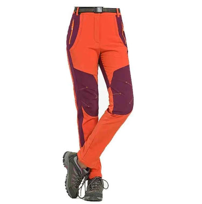 Army green unisex outdoor hiking pants by Mead's Supply & Equipment Outfitters, made of cotton with multiple pockets for trekking.