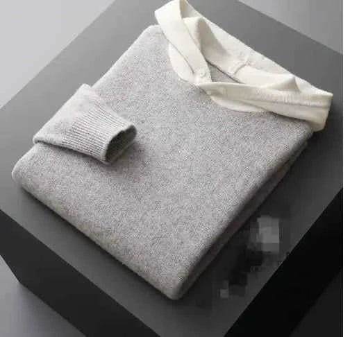 Riverstone Merino Wool men's hoodie by Mead's Supply & Equipment Outfitters, showing a cozy, stylish gray hoodie with a front pocket.