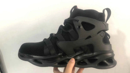 Men's high-top safety shoes by Mead's Supply & Equipment with steel toe, ankle support, black work boots, rugged footwear.