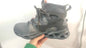 Men's high-top safety shoes by Mead's Supply & Equipment featuring steel toes and ankle support, black work boots.