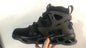 Men's high-top safety shoes by Mead's Supply & Equipment, steel toe work boots with ankle support, black durable footwear.