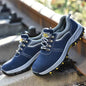 Men's lightweight breathable steel toe safety work shoes in blue, designed for protective and comfortable industrial footwear.