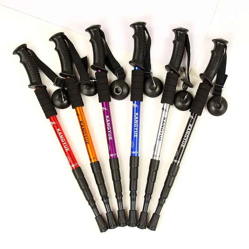 Dark purple Mead's Supply & Equipment outdoor folding trekking poles, 4-section aluminum alloy, lightweight and portable hiking gear.