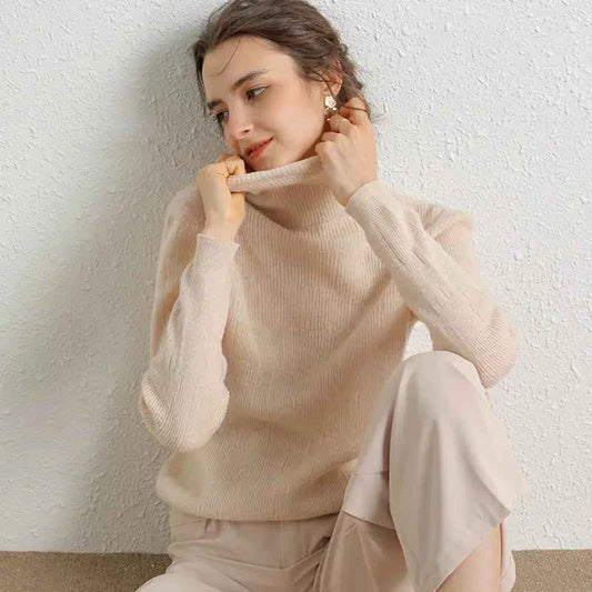 Beige women's 100% Merino Wool turtleneck sweater with slim fit and high neck, perfect for autumn winter layering.
