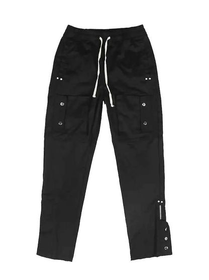 Black women's breasted slit cargo pants with drawstring detail, from Mead's Supply & Equipment Outfitters, shown on a model.