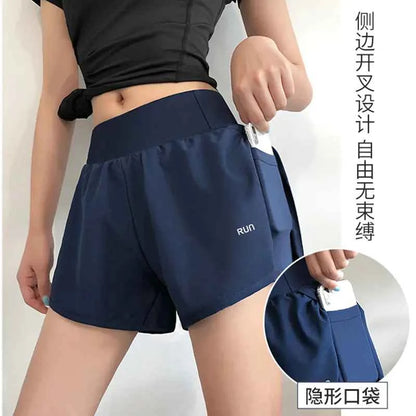 Black women's high-waist quick-dry running shorts by Mead's Supply & Equipment Outfitters, loose fit athletic shorts for fitness and yoga.