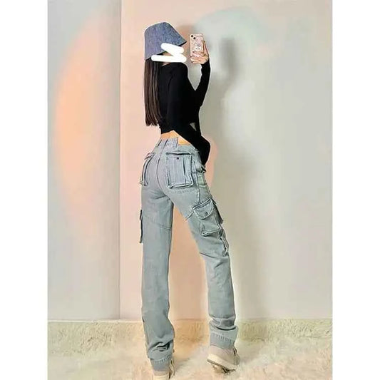 Women's blue high street cargo jeans with multiple pockets from Mead's Supply & Equipment Outfitters, shown with a relaxed fit.