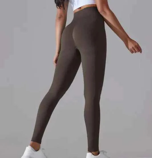 Brown knitted high waist yoga pants by Mead's Supply & Equipment Outfitters, soft stretch activewear for women, small size.