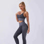 Seamless snake print yoga set for women in deep grey, moisture-wicking activewear from Mead's Supply & Equipment Outfitters.
