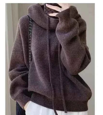 Women's Merino Wool High Neck Sweater Top from Mead's Supply & Equipment Outfitters, showcasing a cozy, fitted knit design.