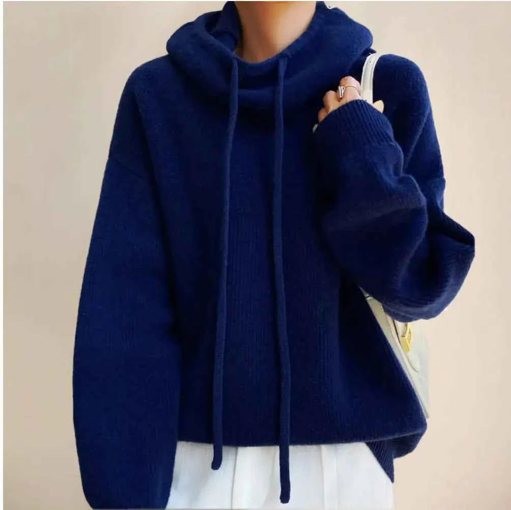 Women's Merino Wool High Neck Sweater Top by Mead's Supply & Equipment Outfitters, showing the cozy, fitted wool sweater with high neckline.