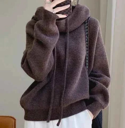 Women's merino wool high neck sweater top by Mead's Supply & Equipment Outfitters, soft knit with a cozy high neckline.