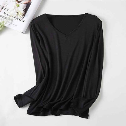 Women's V-neck Merino Wool thermal base layer by Mead's Supply & Equipment Outfitters, slim fit, long sleeve, lake blue, winter layering.
