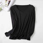 Women's V-neck merino wool thermal base layer from Mead's Supply, in lake blue, slim fit long sleeve for winter layering.