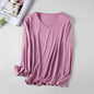 Women's V-neck Merino wool thermal base layer from Mead's Supply & Equipment in lake blue, long sleeve, slim fit for winter layering.