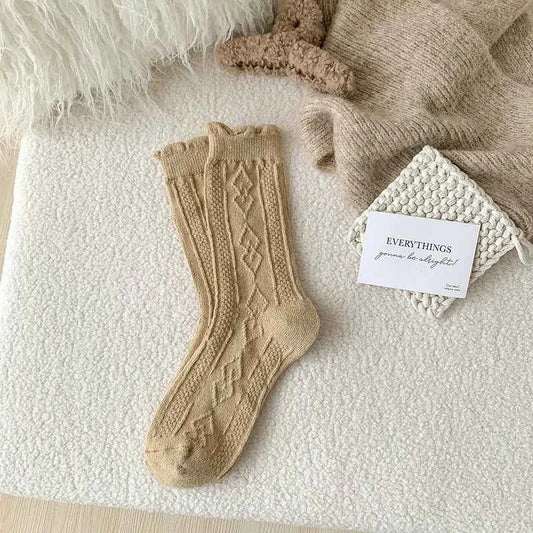Thick diamond-shaped wool mid-thigh socks for women, warm cozy fall and winter leg warmers by Mead's Supply & Equipment Outfitters