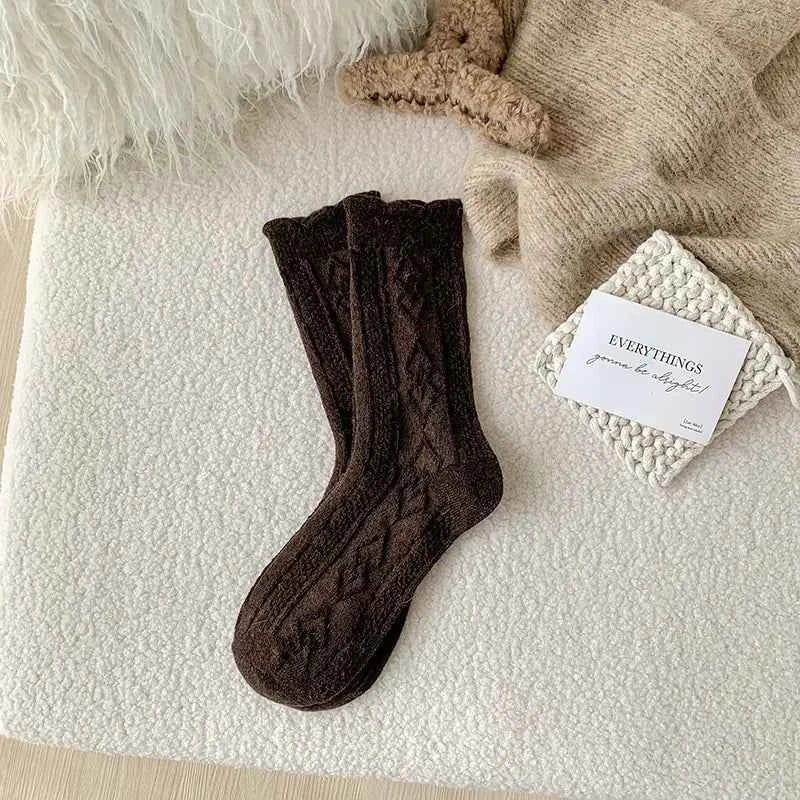 Thick diamond-shaped wool mid-thigh socks for women, warm cozy leg warmers ideal for fall and winter warmth.