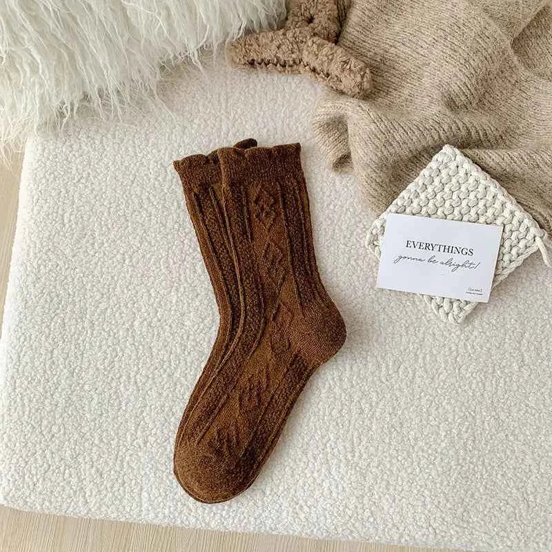 Thick diamond-shaped wool mid-thigh socks for women, warm cozy leg warmers ideal for fall and winter.